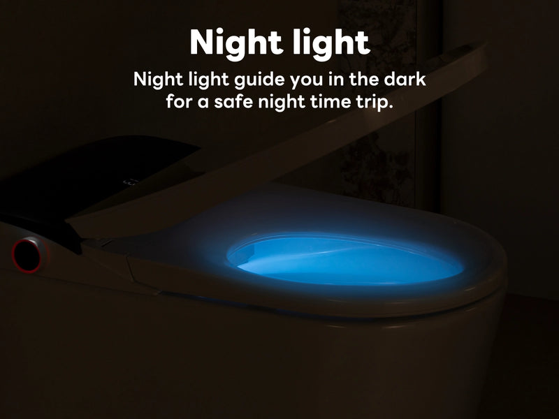 Bathroom scene with a night light on a toilet seat, glowing blue in the dark.